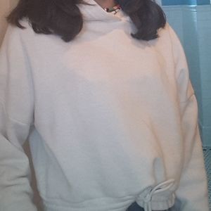 Cropped white sweatshirt.